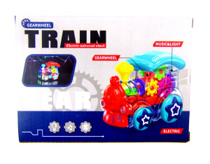 Паровоз прозрачный с шестерёнками звуковые и световые эффекты 12*17 см.